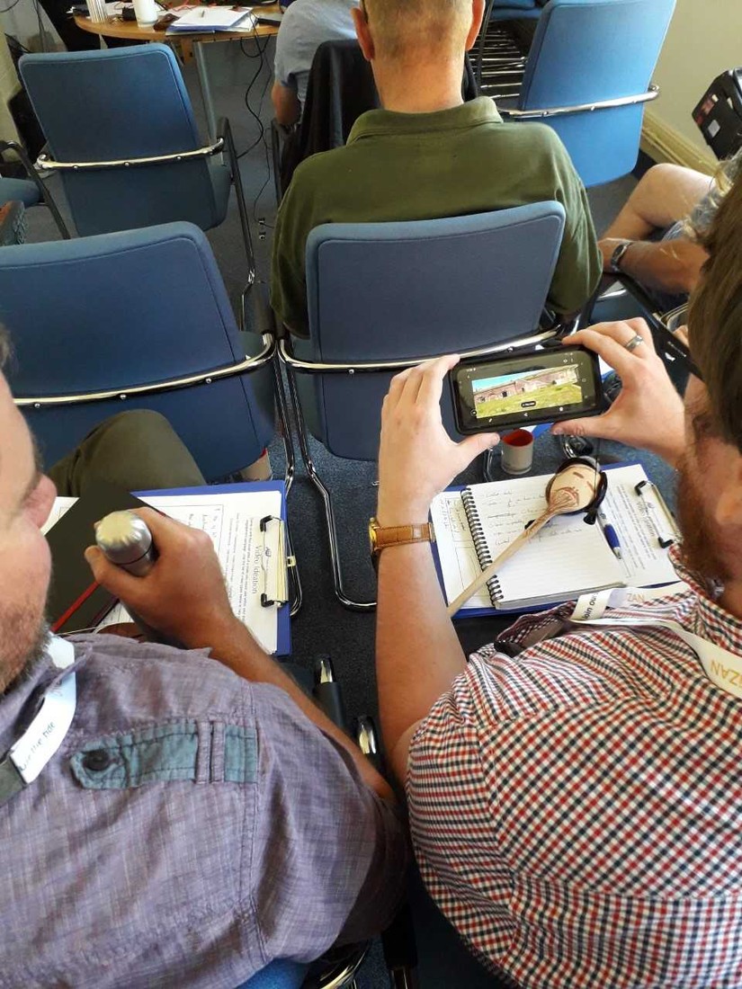 Sam and Chris review the footage they shot